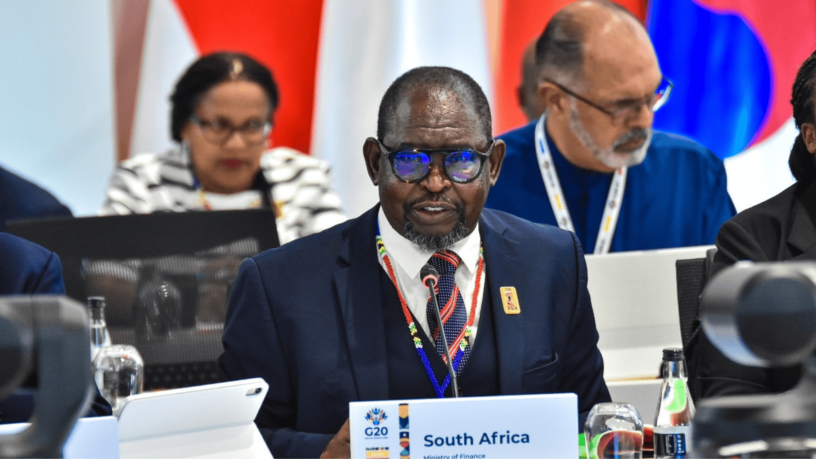 Minister of Finance. Umbele. Suit and Tie